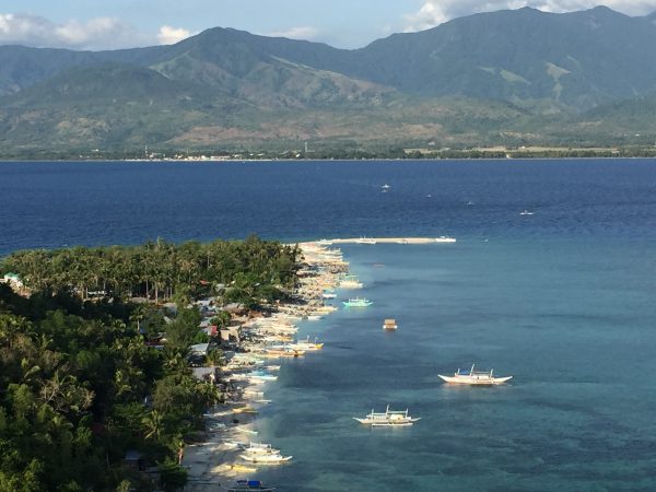 The sandbar, the sea, and the sailboats from Ralantawan (Viewing Point). 